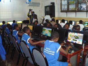Schoolchildren using computers 