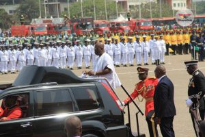 President Akufo-Addo (wearing smock) inspecting the parade