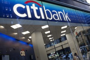 Customers stand inside Citigroup Inc. Citibank branch in New York, U.S., on Tuesday, March 5, 2013. The six largest U.S. banks may return almost $41 billion to investors in the next 12 months, the most since 2007, as regulators conclude firms have amassed enough capital to withstand another economic shock. Photographer: Victor J. Blue/Bloomberg via Getty Images