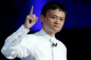 Jack Ma, chairman of Alibaba Group Holding Ltd., gestures as he speaks at SoftBank World 2014 in Tokyo, Japan, on Tuesday, July 15, 2014. As SoftBank Corp. Chief Executive Officer Masayoshi Son pushes for a takeover of T-Mobile US Inc., the Japanese billionaire is asking banks to commit financing for a longer-than-usual amount of time, underscoring the intense regulatory review he faces. Photographer: Kiyoshi Ota/Bloomberg *** Local Caption *** Jack Ma