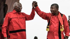 Lourenco takes over from dos Santos, left, who ruled Angola for almost four decades [Marco Longari/AFP]