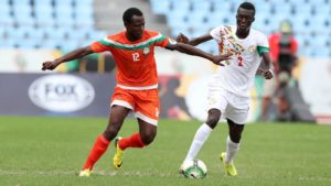 Dela Sakou Souleymane of Niger challenged by Alhassane Ndao of Senegal during 2017 WAFU Cup of Nations match between Senegal and Niger at Cape Coast Sports Stadium in Cape Coast, Ghana on 15 September 2017 ©Muzi Ntombela/BackpagePix