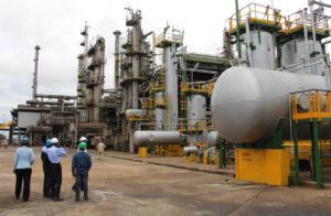 The oil refinery in Warri, Nigeria, pictured in August 2015, has roared back to life after years of neglect. Nigeria and Libya have added 550,000 barrels a day of crude-oil production since October, wiping out almost half of the cuts achieve by other members of OPEC. PHOTO: PATRICK MCGROARTY/THE WALL STREET JOURNAL