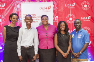 From (l-r), Madam Bola Atta, CEO, UBA Foundation, Fred Asante, a beneficiary of the scholarship, UBA Ghana MD/CEO, Mrs Abiola Bawuah, Dorcas Nuku Darko, a beneficiary of the scholarship, and Mr Augustus Owusu-Agyemfra of the GES